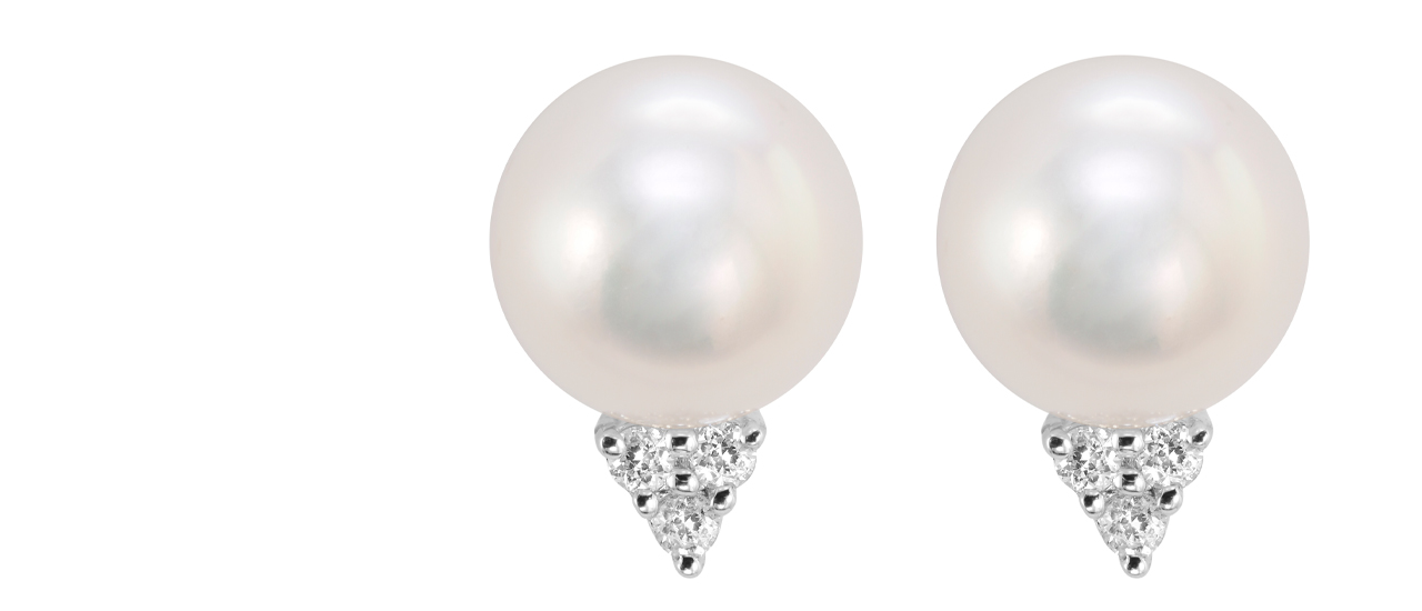 Pearl stud earrings and diamonds make a winning office combo.