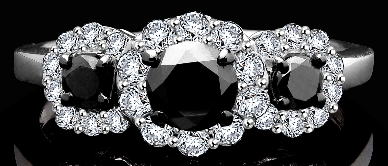 Three stone black diamond ring